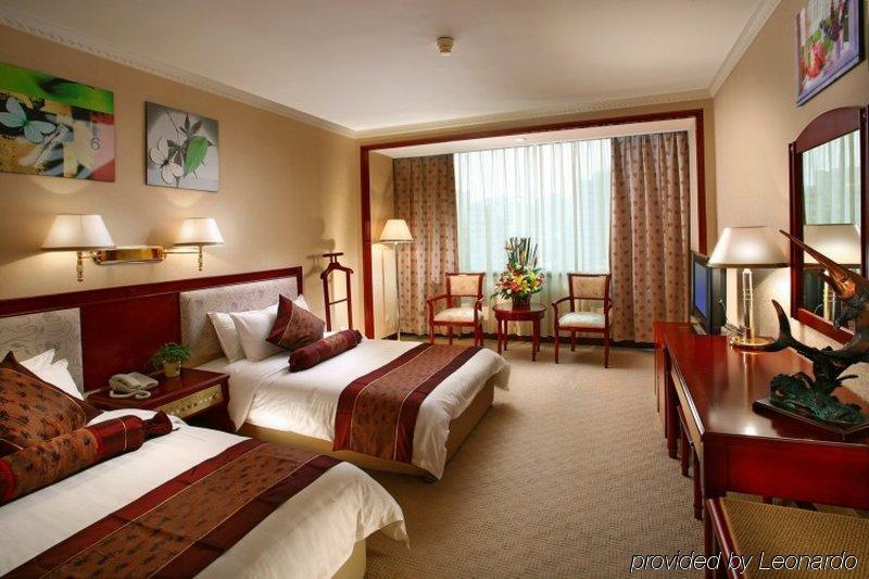 Xiamen Huaqiao Hotel Habitación foto