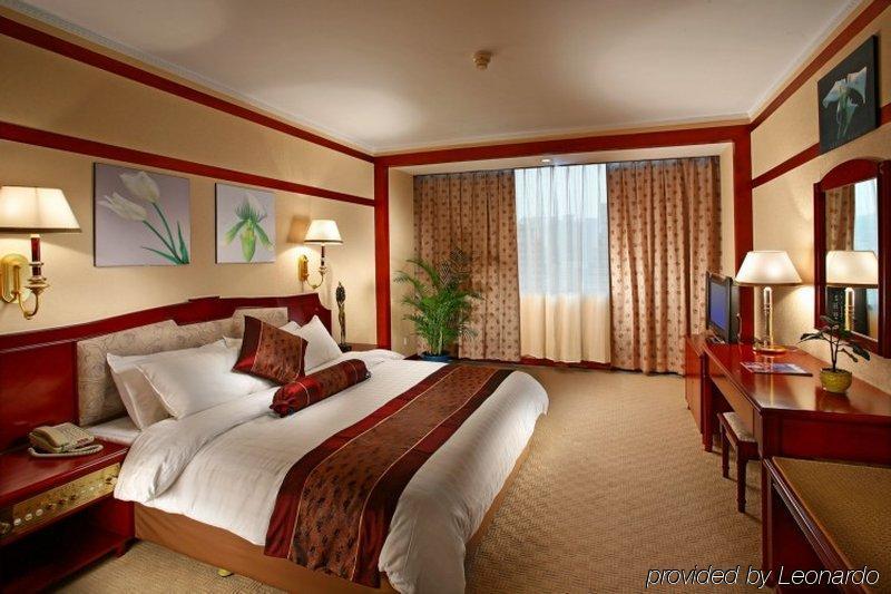 Xiamen Huaqiao Hotel Habitación foto